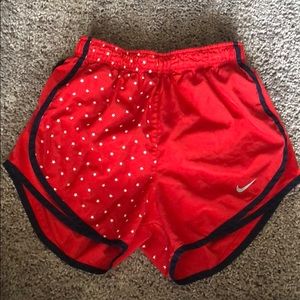 Red Nike shorts